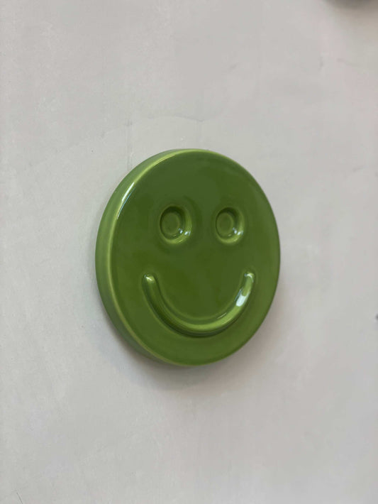Green 'HAPPY' ceramic artwork by Edith Beurskens, handcrafted and glazed.