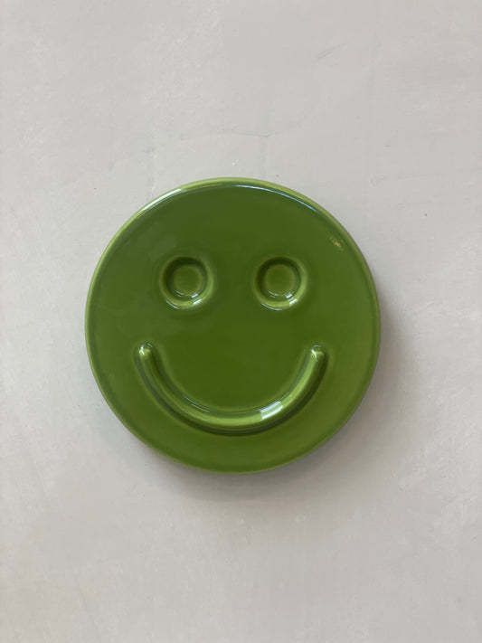 Green 'HAPPY' ceramic artwork by Edith Beurskens, handcrafted and glazed, perfect for kids' rooms.