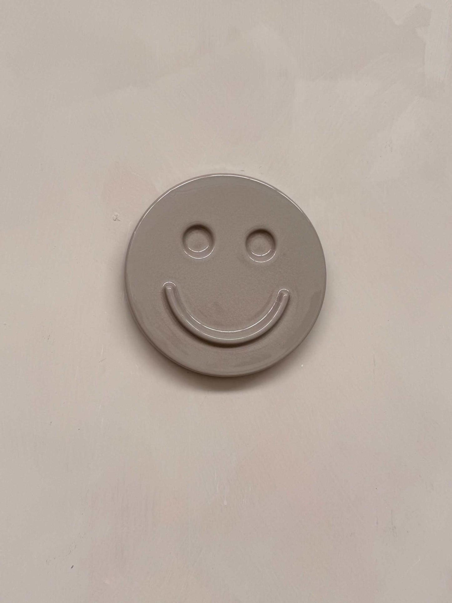 HAPPY ceramic wall art smiley face made from glazed concrete ceramic clay wall decoration