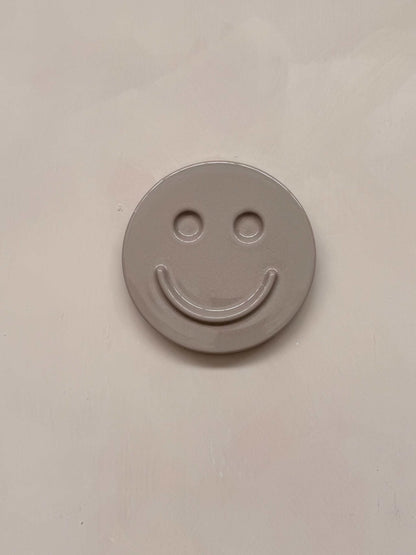 HAPPY ceramic wall art smiley face made of concrete minimalist design