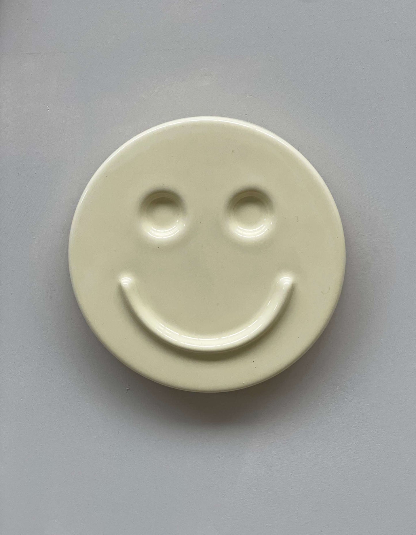 Ceramic smiley face from 'HAPPY' set by Edith Beurskens.