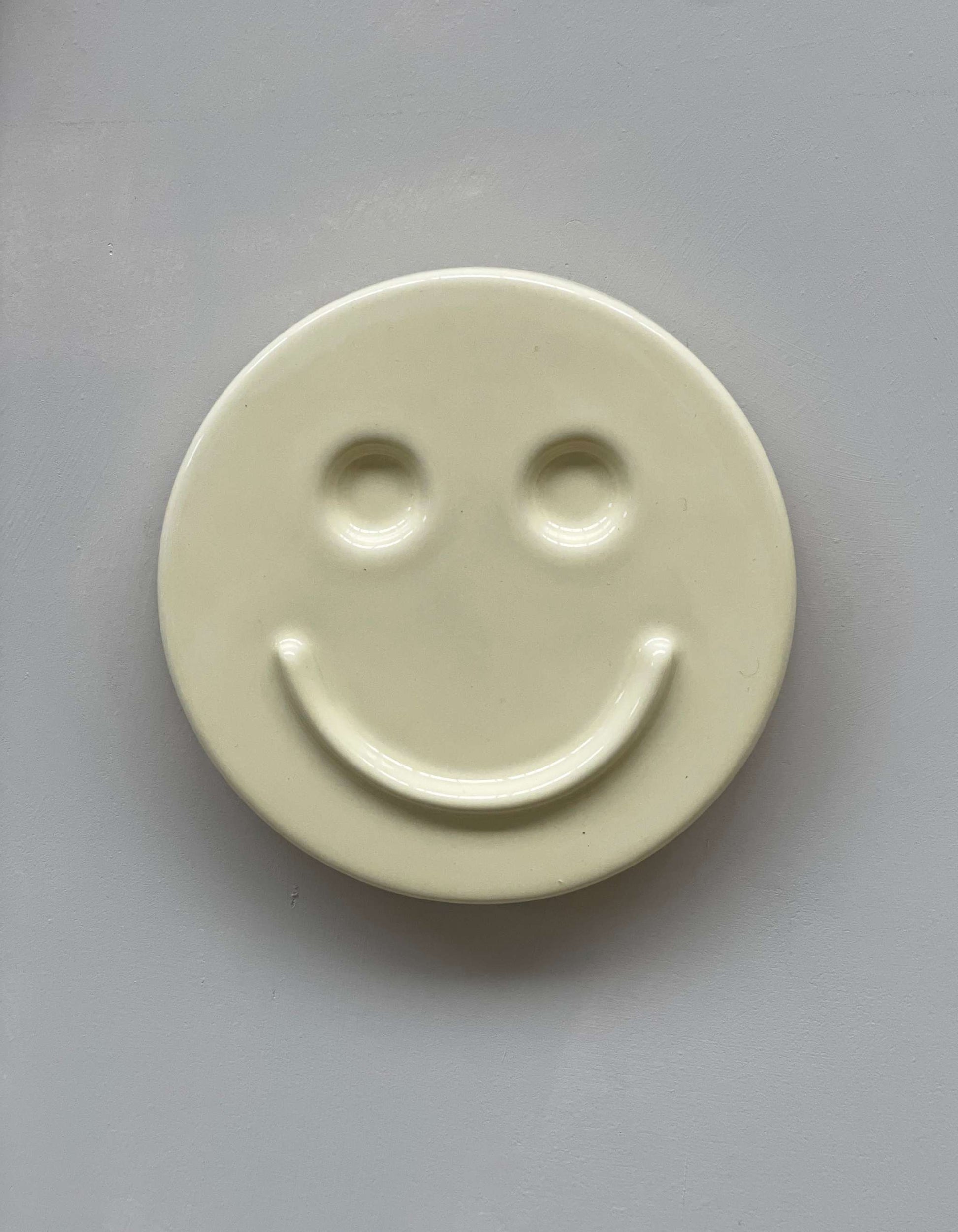 Ceramic smiley face from 'HAPPY' set by Edith Beurskens.
