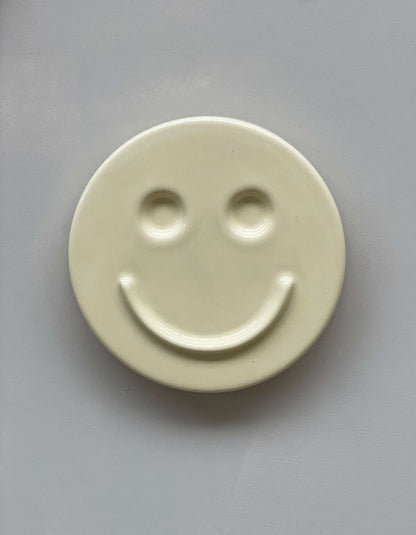 Ceramic smiley face from 'HAPPY' set by Edith Beurskens.