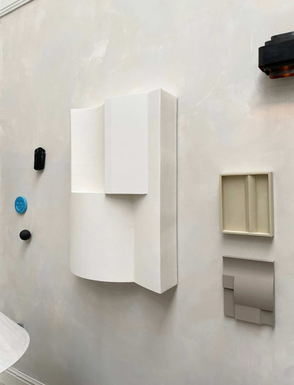ELEMENT BRUTALIST artwork in Shadow White with structured plaster finish on wall.