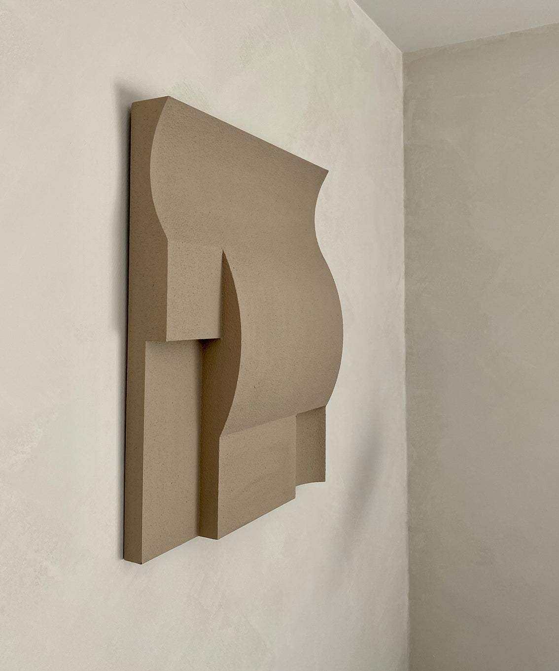 Modern art wall sculpture made from plant-based PLA, featuring a geometric design with sand texture and eco-paint finish.