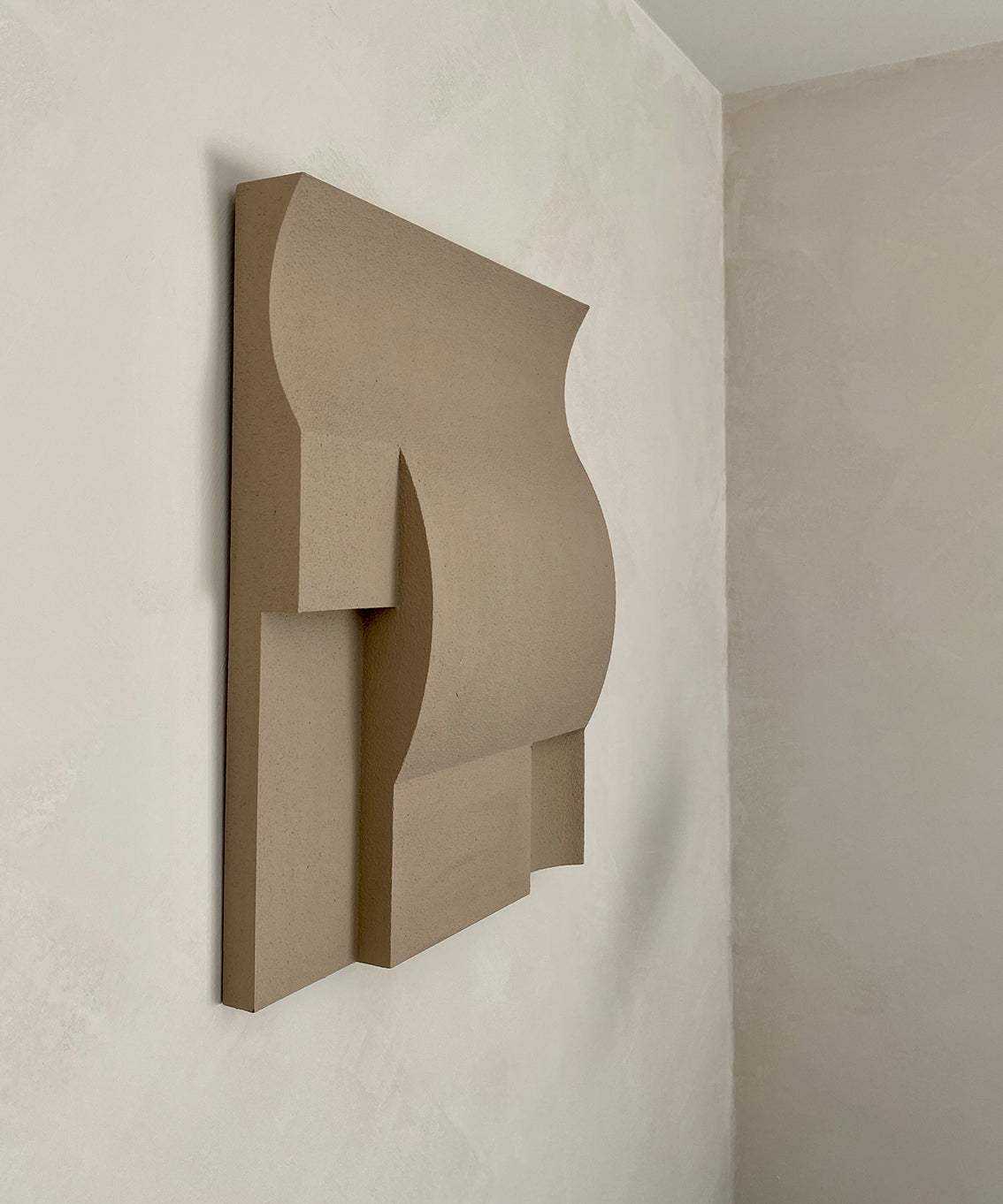 Modern art shapes wall sculpture in dark fog, attic, and anthracite.