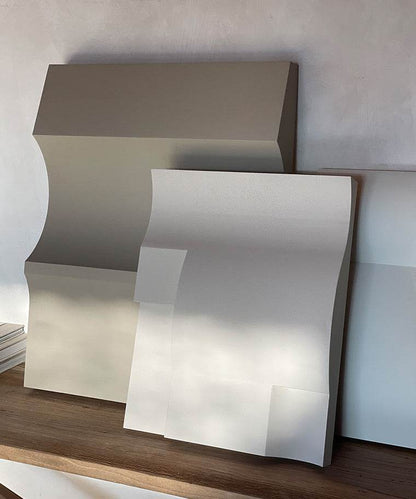 Modern art pieces made of biodegradable PLA with sand texture.