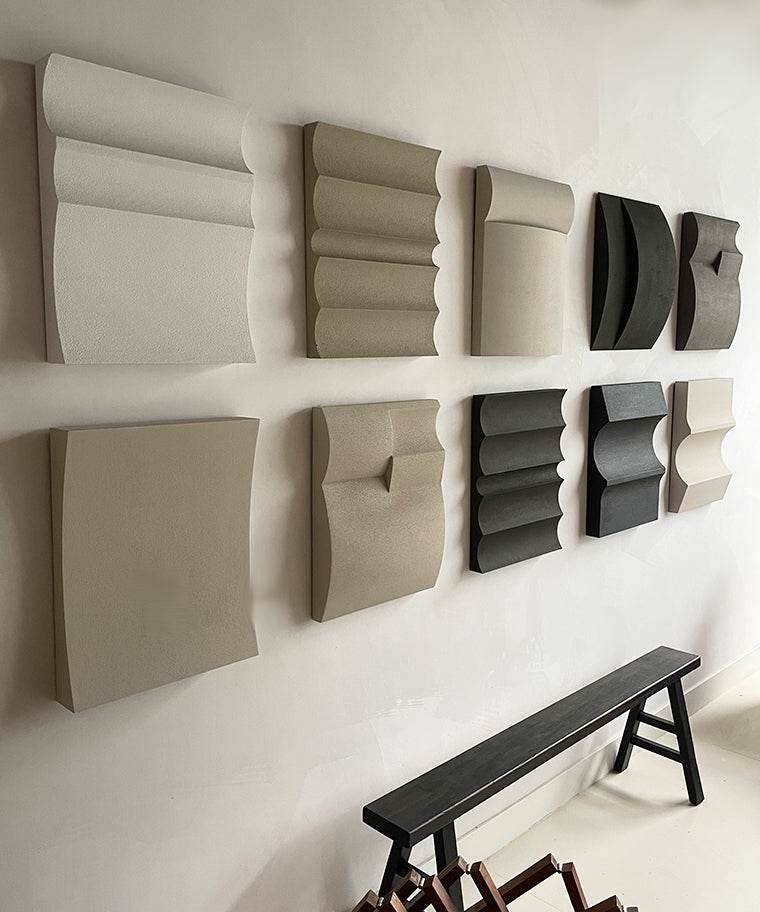 Hand-made 3D art wall pieces in neutral shades with sand texture and eco-paint.