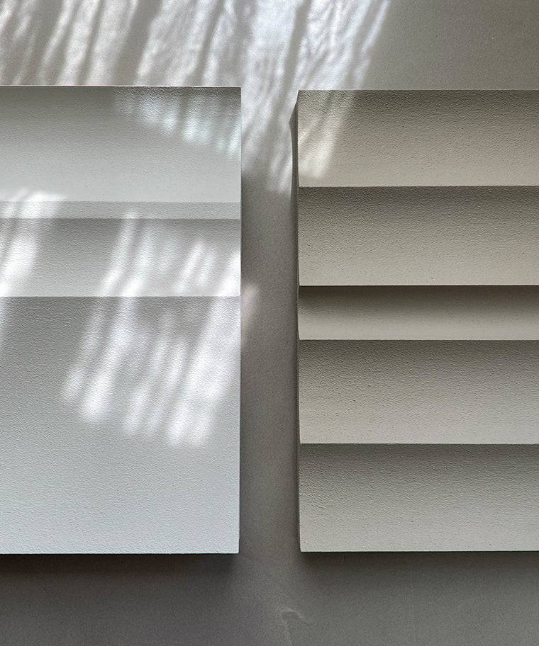 Handmade art titled '#22.01 Ark' with textured sand finish and eco-paint on displayed panels.