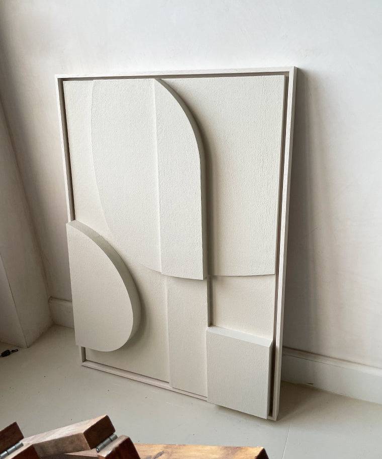 Handmade wall art titled "#2.1 Blanche" featuring abstract geometric shapes in a sand-textured finish.