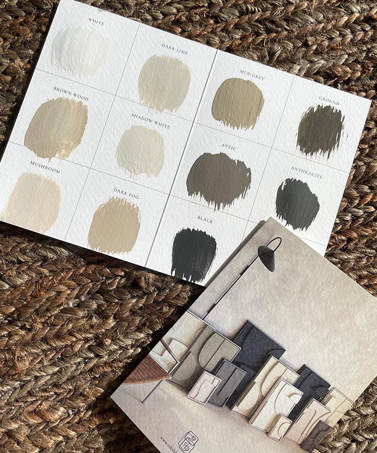 A6 color swatches card featuring 11 base colors, laid on a textured surface.