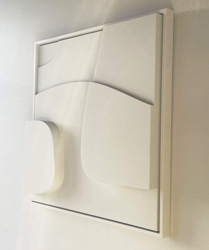 Handmade abstract wall art in white with sand texture and eco-paint.