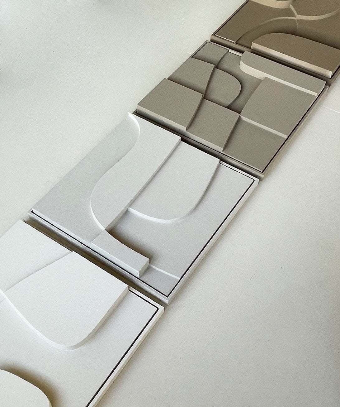 Handmade 3D art panels with customizable colors and sand texture finish.