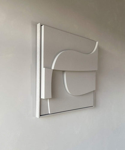 Handmade geometric wall art with sand texture and eco-paint finish.