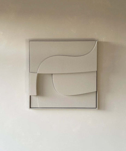 Hand-made abstract wall art in neutral tones with sand texture.