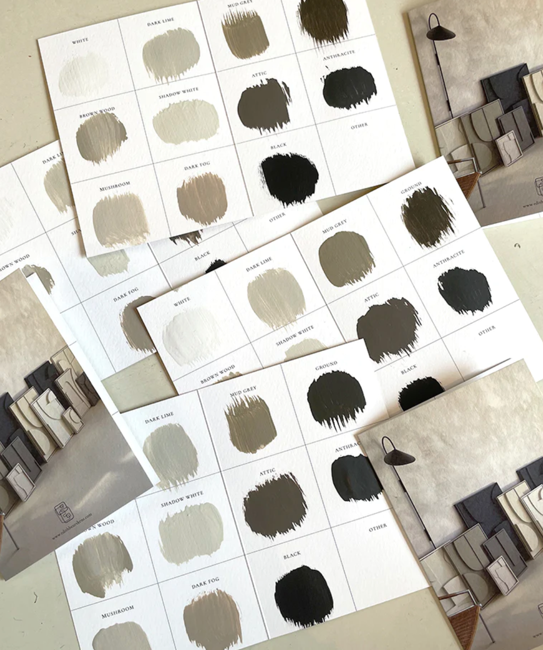 Color swatches and modern art shapes in dark fog, attic, and anthracite.